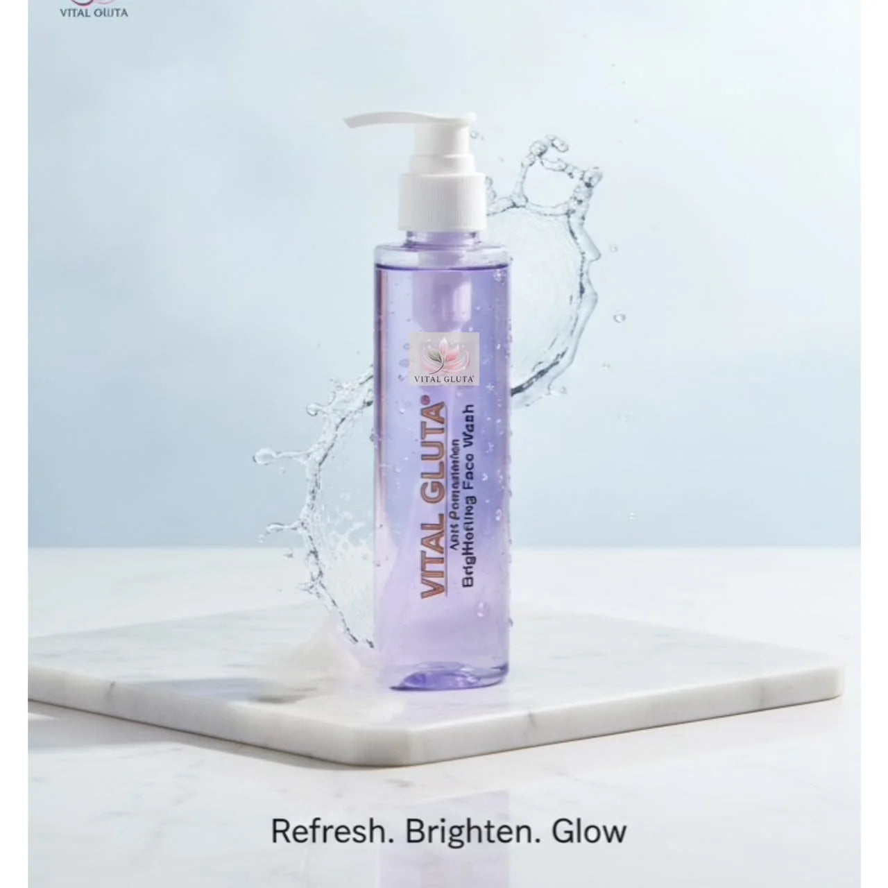 A bottle of Vital Gluta Brightening Face Wash with a white pump dispenser, set on a white marble slab with a water splash graphic behind it against a light blue background.