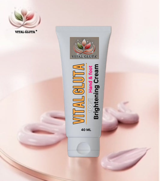 A 40 mL squeeze tube of Vital Gluta Brightening Cream for hands and feet, displayed on a soft pink background with decorative cream swirls. The tube is white with orange, pink, and black text, and features the Vital Gluta brand logo.