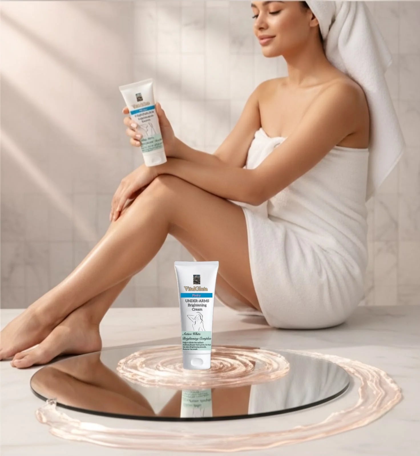 Woman sitting with a towel on her head, holding vitalgluta pinky brightening cream  and applying a tube of cream to her leg.